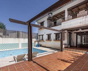 Exterior view of Single-family semi-detached for sale in Láchar  with Terrace, Swimming Pool and Balcony