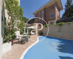 Exterior view of House or chalet for sale in  Madrid Capital  with Air Conditioner, Terrace and Swimming Pool