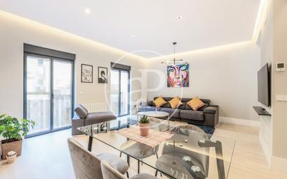 Living room of Flat for sale in  Madrid Capital  with Air Conditioner and Balcony