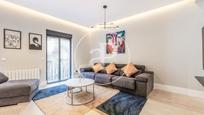 Living room of Flat for sale in  Madrid Capital  with Air Conditioner and Balcony