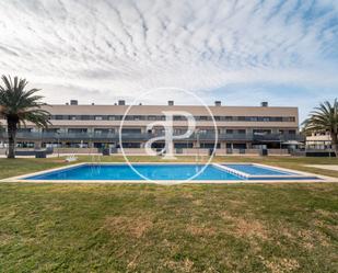 Piscina de Casa adosada en venda en La Pobla de Farnals amb Aire condicionat, Terrassa i Piscina