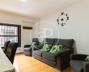 Sala d'estar de Casa adosada en venda en Cullera amb Aire condicionat i Terrassa