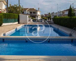 Piscina de Casa adosada de lloguer en Sagunto / Sagunt amb Aire condicionat, Terrassa i Piscina