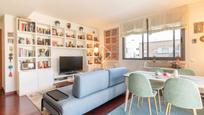 Living room of Flat for sale in Sant Cugat del Vallès  with Air Conditioner, Terrace and Swimming Pool