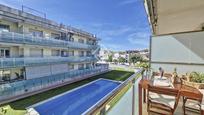 Swimming pool of Flat for sale in Cubelles  with Air Conditioner, Terrace and Swimming Pool