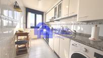 Kitchen of Flat for sale in Oviedo   with Heating, Parquet flooring and Storage room