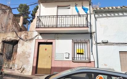 Vista exterior de Casa adosada en venda en Cuevas Bajas amb Terrassa i Balcó