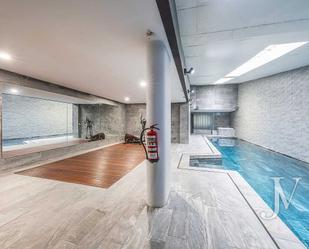 Swimming pool of Planta baja for sale in  Madrid Capital  with Air Conditioner