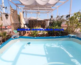 Swimming pool of House or chalet for sale in  Sevilla Capital  with Air Conditioner and Terrace