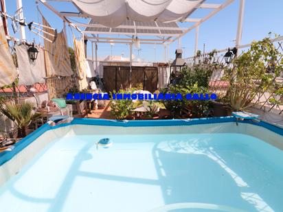 Swimming pool of House or chalet for sale in  Sevilla Capital  with Air Conditioner and Terrace