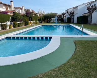 Swimming pool of Single-family semi-detached for sale in El Vendrell  with Air Conditioner, Terrace and Balcony