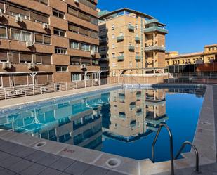 Swimming pool of Flat for sale in  Granada Capital  with Heating, Parquet flooring and Terrace