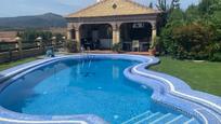 Swimming pool of House or chalet for sale in Algeciras  with Air Conditioner, Heating and Private garden